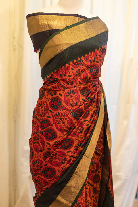 Autumn Elegance Orange and Black Printed Kanchipuram Silk Saree