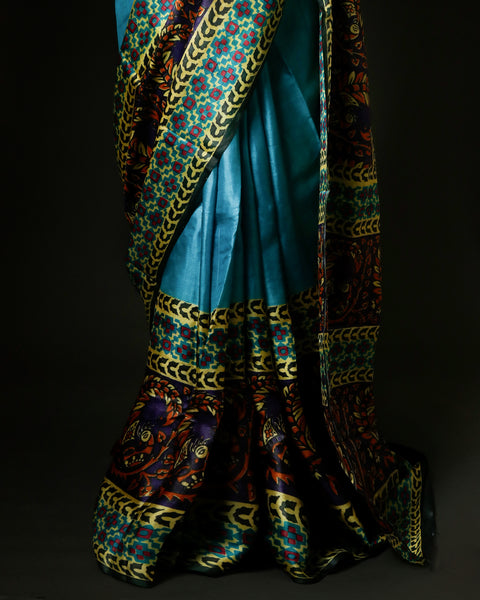 Peacock Blue Tussar Silk Saree with Intricate Kalamkari Print Border