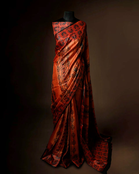 Burnt Orange Tussar Silk Saree with All-Over Ajrakh Hand-Block Print