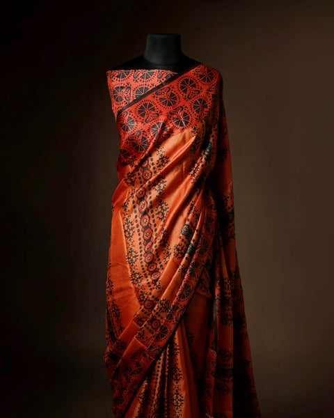 Burnt Orange Tussar Silk Saree with All-Over Ajrakh Hand-Block Print