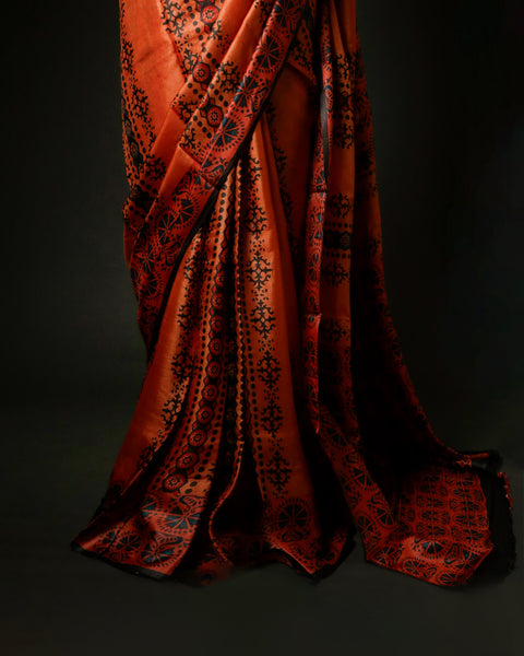 Burnt Orange Tussar Silk Saree with All-Over Ajrakh Hand-Block Print