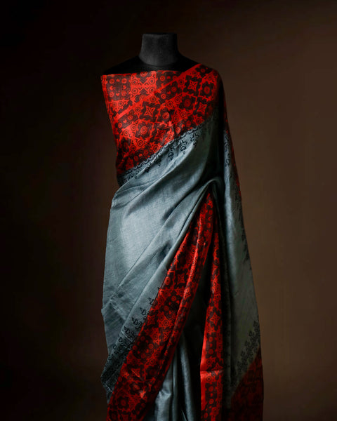 Gunmetal Grey Tussar Silk Saree with Crimson Red Ajrakh Border