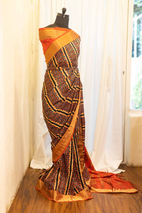 Mystic Sunset Orange and Black Striped Printed Kanchipuram Silk Saree